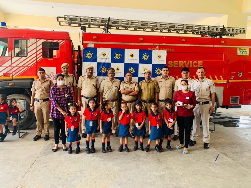TSWY students tie rakhis to firefighters to show their respect towards them